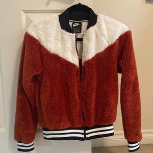 Burt orange Nike sherpa bomber